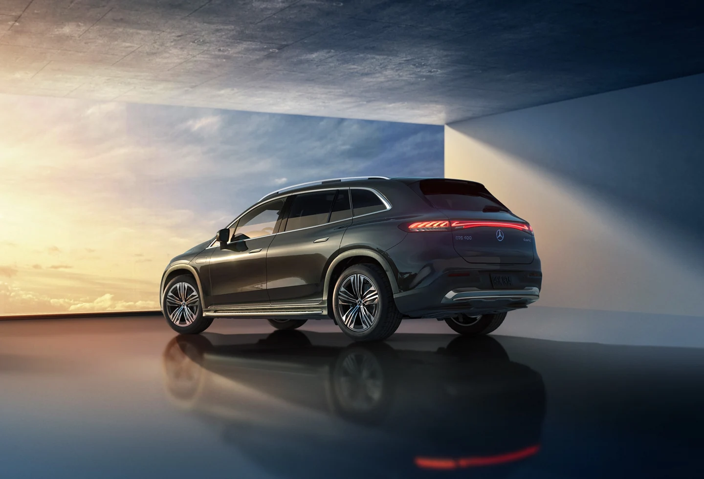 Rear three-quarter view of the Mercedes-Benz EQS SUV showing its taller passenger and cargo body.